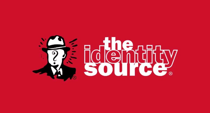 The Identity Source logo featuring a red background with white lowercase text and a black-and-white illustration of a man in a fedora with a question mark on his face.
